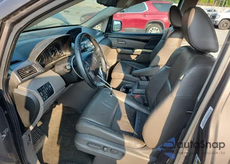 2012 Honda Odyssey Touring z USA, uszkodzony, nr VIN 5FNRL5H95CB115780